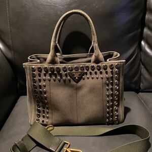 Prada studded canepa tote bag.